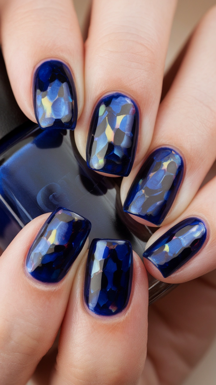 a photo of a manicure with a rich blue s IFIILA2IWbWJWEcbBN8bQQ NScj1SotQoWhbSjc dd7oA
